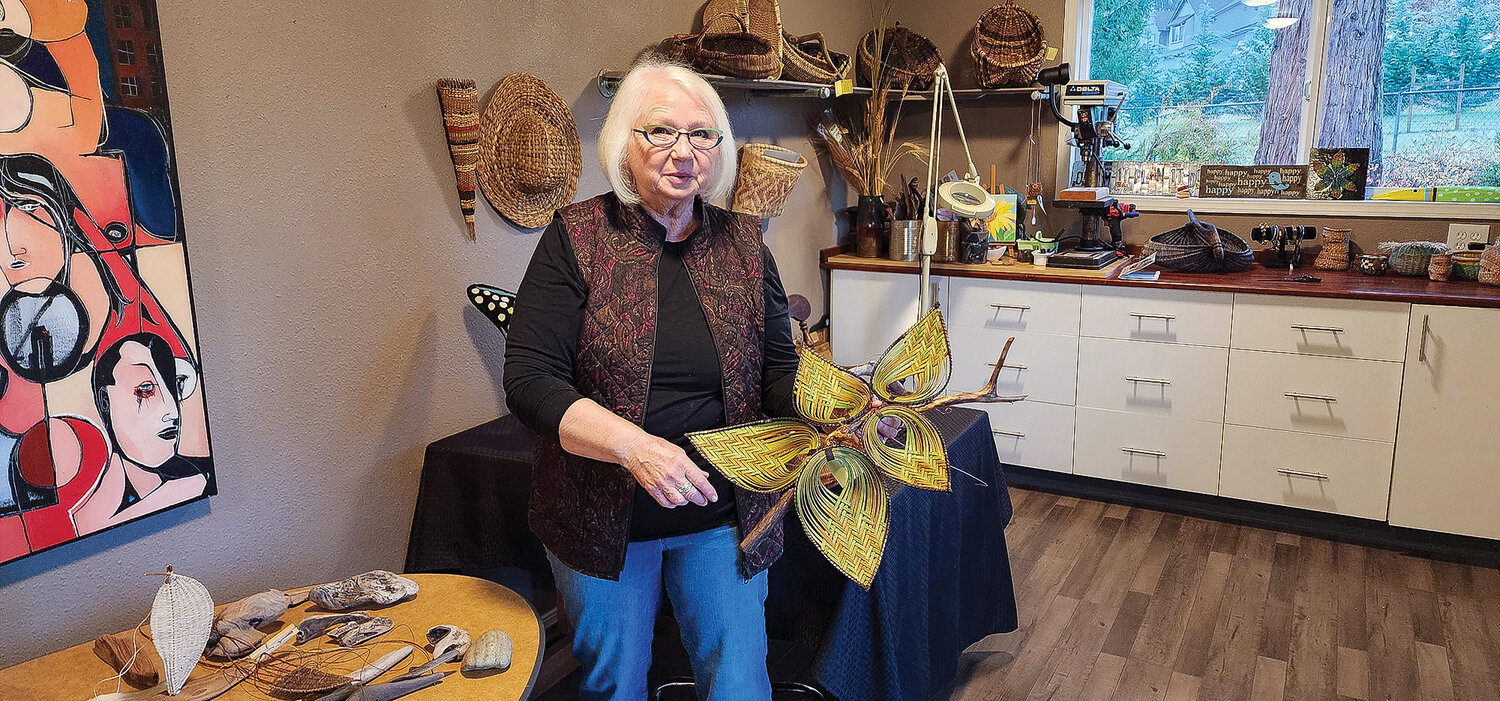 Connie Ford uses nature as inspiration for many of her artworks, like this art piece using driftwood and woven fibers.