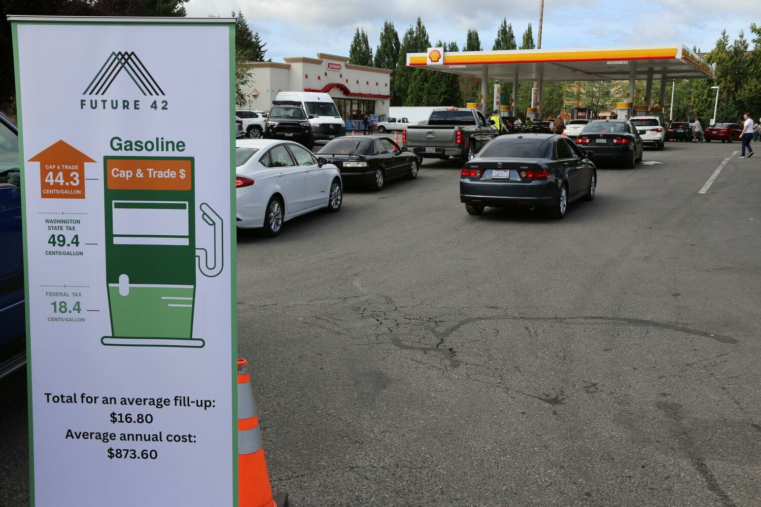 Hundreds of vehicles waiting in line for a gas tax holiday event in Kent, Washington. The event, which reduced gas prices to $3.82 per gallon was sponsored by Future 42 and the Washington state chapter of Americans For Prosperity.