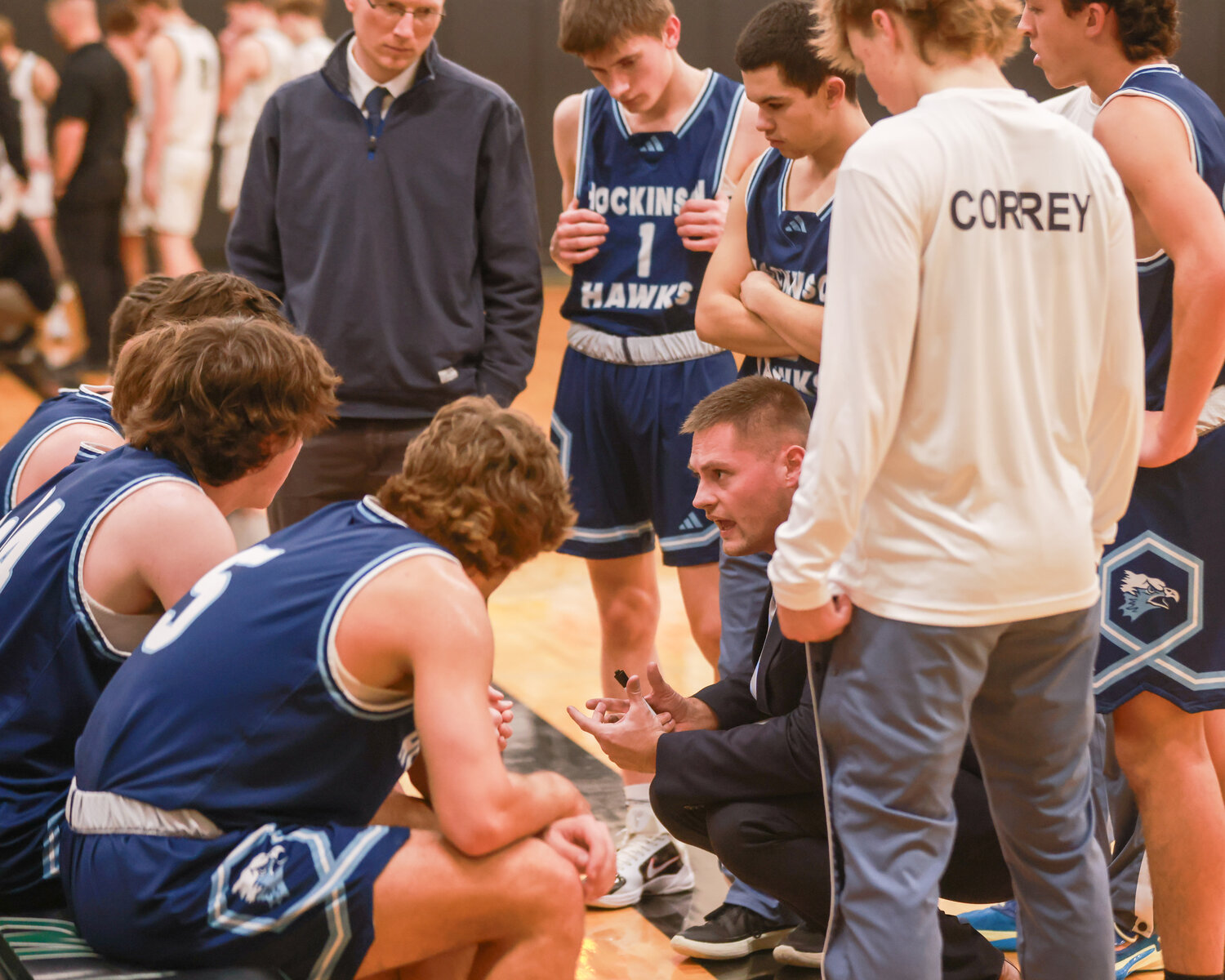 Hockinson's first-year head coach, Dalton Rausch, talks to his team in a timeout during the Hawks’ 70-68 win over the Beavers on Friday, Dec. 15.