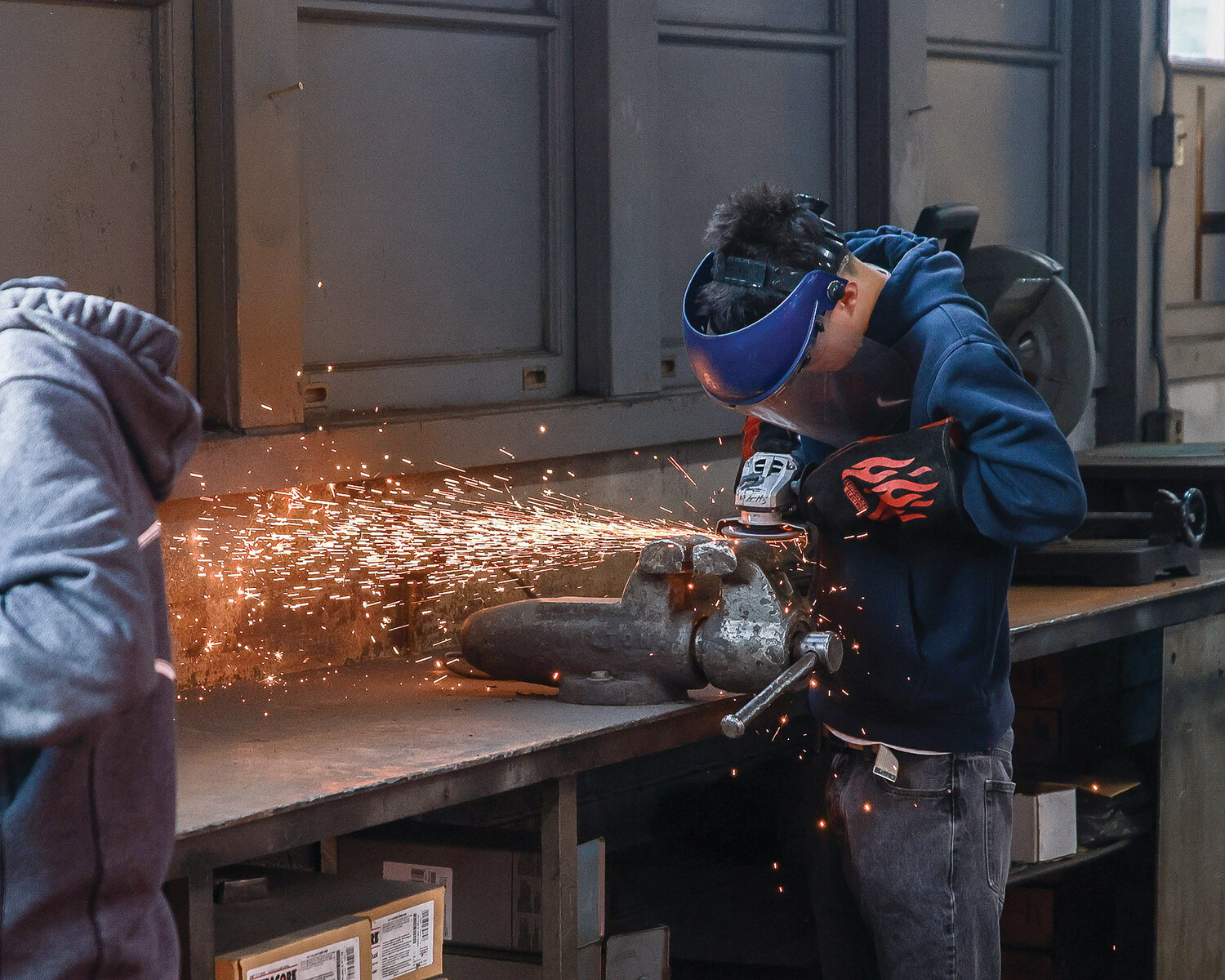 Battle Ground High School student Kainoa Ke works on a project in the welding shop on Thursday, Feb. 1.
